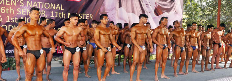 The bodybuilders pose after the testing of weight at the Kabaddi Stadium on Saturday. The Bay Emporium 26th Senior, 11th Masters, 1st Newcomers Bodybuilding Competition will be held at the Auditorium of the National Sports Council Tower today.