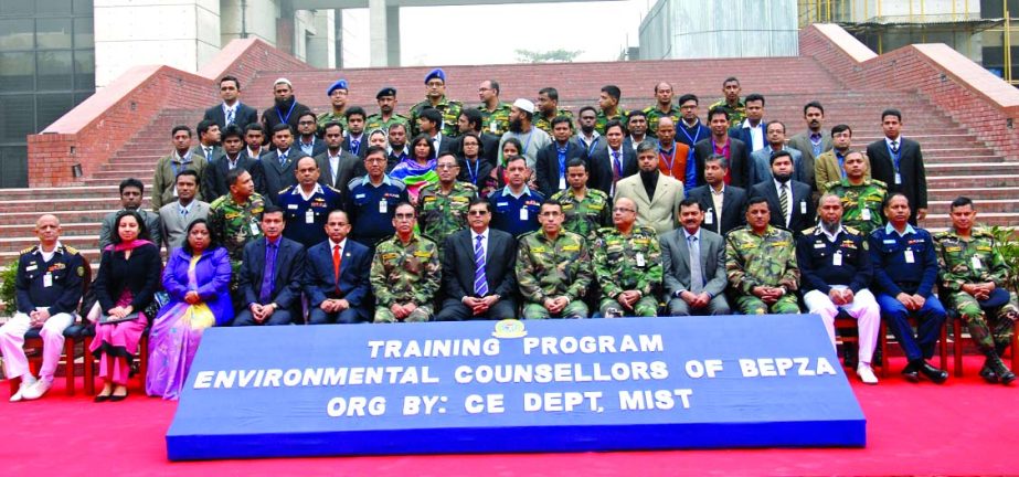 Major General Mohd Habibur Rahman Khan ndc, psc, Executive Chairman of Bangladesh Export Processing Zones Authority, poses with the trainees of a three-week training program to enrich EPZs' environment organized by BEPZA and Military Institute of Science