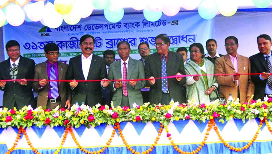 Md Yeasin Ali, Chairman of the Board of Director of Bangladesh Development Bank Limited, inaugurating its 31st branch at Kazirhat in Nilphamari on Sunday. Dr Md Zillur Rahman, Managing Director of the bank presided.