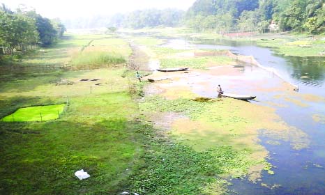 JHENIDAH: Land grabbing continued at vast area of Kapotakha River at Kotchandpur Upazila . This picture was taken yesterday.