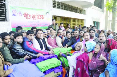 DINAJPUR: Dinajpur Swechchhasebak Dal, District Unit distributing blankets among the cold -hit people at Dinajpur Press Club premises on Sunday.