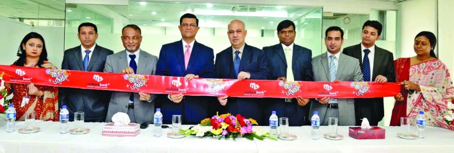 Md Ahsan-uz Zaman, Managing Director of Midland Bank Limited, inaugurating the bank's new branch at Gulshan-2 on Tuesday.