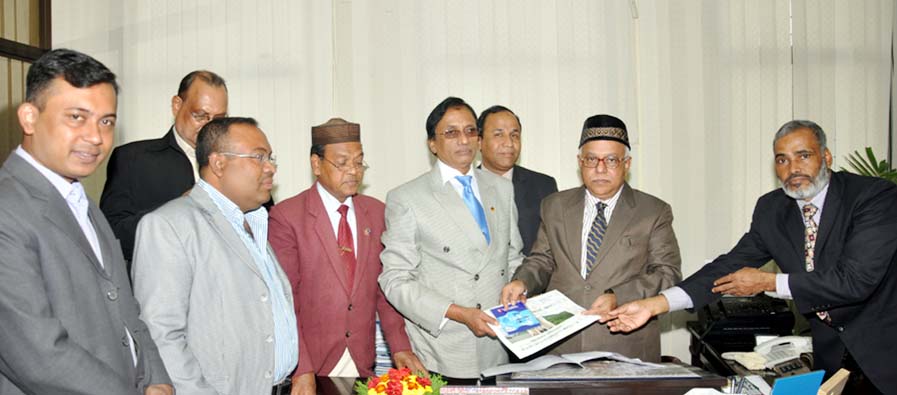 Board officials handing over JSC examination result to CCC Mayor M Monzoor Alam at his office yesterday.