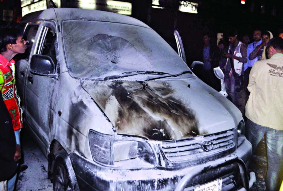 Jamaat activists torched a private car at Motijheel area on Tuesday evening ahead of today's and tomorrow's hartal protesting ICT verdict on party leader Azharul Islam.