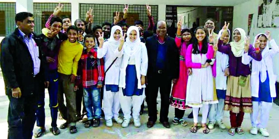 DINAJPUR: Jubilant students of Sayedpur Govt Technical University posed for photograph with principal Md Amir Ali Azad who achieved GPA- 5 in JSC examination on Tuesday.