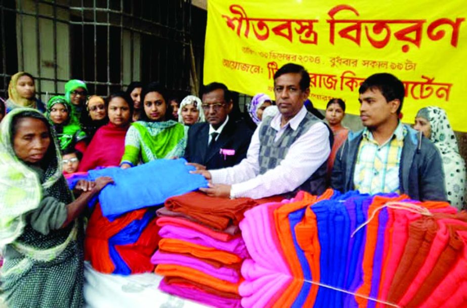 KISHOREGANJ: Tuberosa Kidergarten School distributing blankets among cold -hit people in Kishoreganj recently.