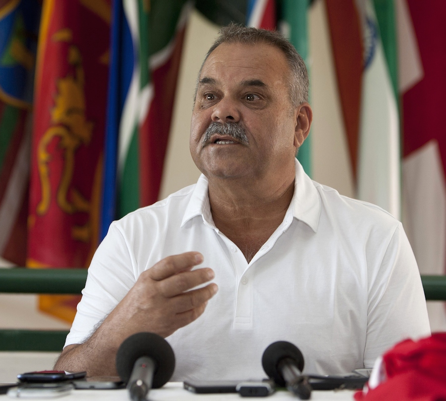 Dav Whatmore, the new coach of Zimbabwe's national cricket team gestures as he speaks with the media after he was announced as the new coach during a press conference in Harare on Tuesday.