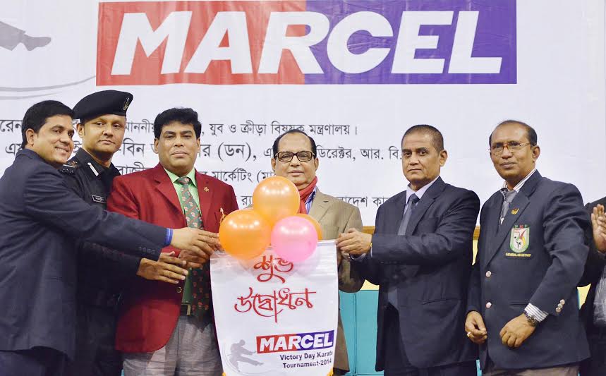 State Minister for Youth and Sports Biren Sikder inaugurating the Marcel Victory Day Karate Competition by releasing the balloons as the chief guest at the Shaheed Suhrawardy Indoor Stadium in Mirpur on Wednesday.