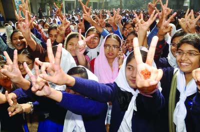 BOGRA: Students of Bogra Govt Girls' High School showing V- sign after securing 2nd position in the JSC examination on Tuesday.