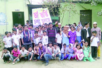 SAVAR: Jubilant students of Alhaj Abu Taleb Mollah Public School poses with their teachers after successful result in JSC and PSC examinations on Tuesday.