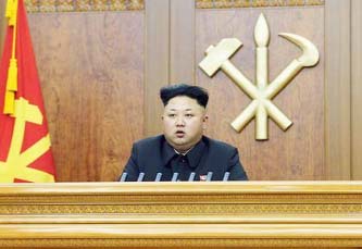 North Korean leader Kim Jong Un delivers a New Year's address in Pyongyang on Thursday.