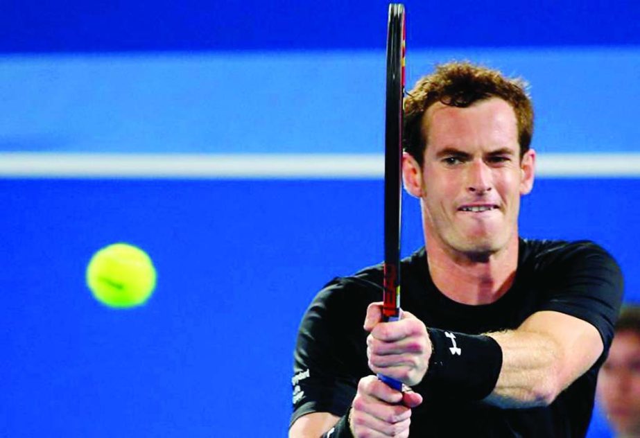 British tennis player Andy Murray returns the ball to Feliciano Lopez of Spain during their game in the Mubadala World Tennis Championship in Abu Dhabi on Thursday.