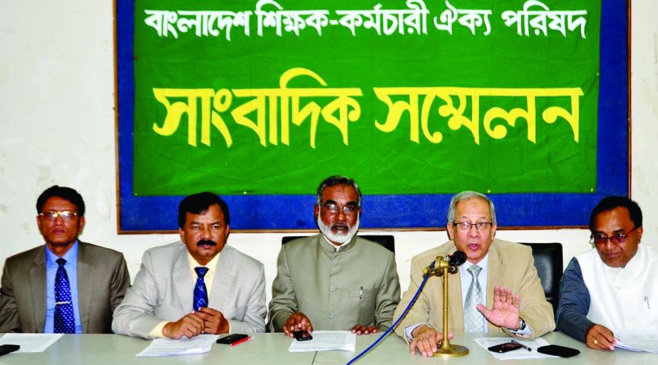 Convenor of Bangladesh Shikshak-Karmochari Oikya Parishad Dr Noor Mohammad Talukder speaking at a press conference at Dhaka Reporters Unity auditorium on Saturday demanding execution of pay scale in all non-government educational institutions together lik