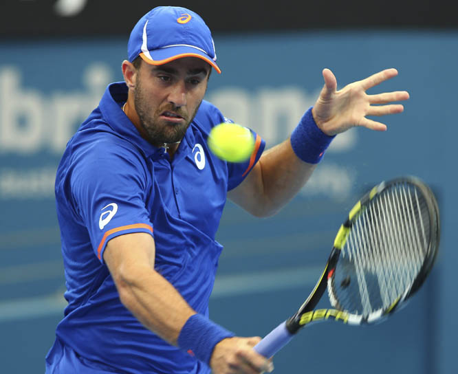 Steve Johnson of the USA plays a shot during his match against Marinko Matosevic of Australia at the Brisbane International tennis tournament in Brisbane, Australia on Tuesday.