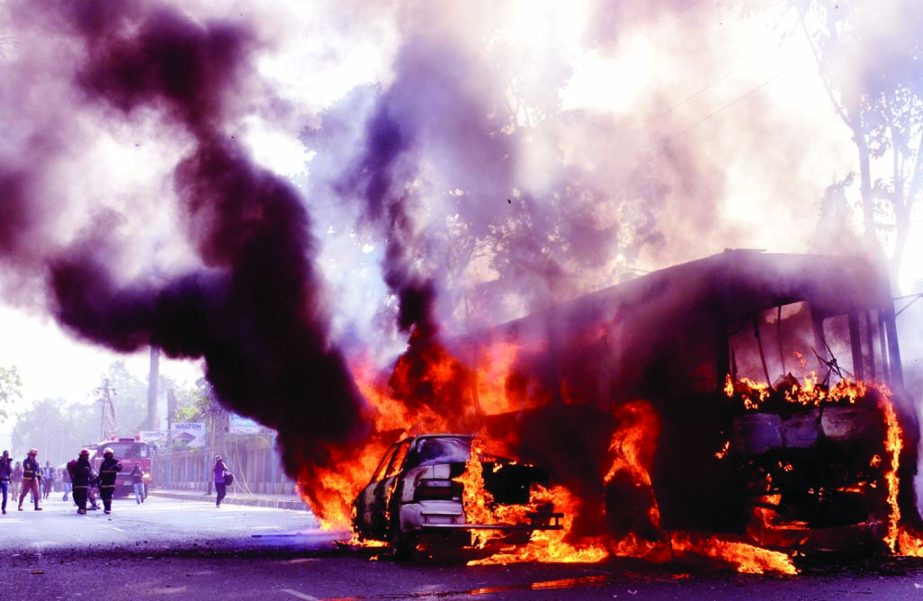 A passenger bus and a private car were torched by pro-20-party alliance supporters at Dilkusha area near RAJUK Bhaban on the first day of its blockade programme on Tuesday.