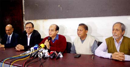 Prime Minister's Information Affairs Adviser Iqbal Sobhan Chowdhury speaking at a press conference at the Jatiya Press Club on Tuesday protesting overnight staying of outsiders inside the Press Club.