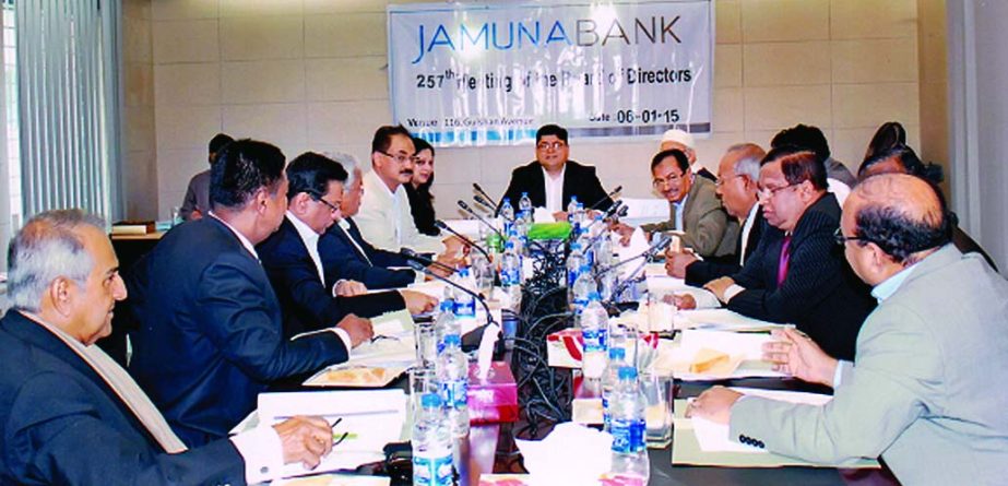 Shaheen Mahmud, Chairman of the Board of Directors of Jamuna Bank Limited, presiding over 257th board meeting at its head office recently. Nur Mohammed, Chairman of Jamuna Bank Foundation, Audit Committee Chairman Md Rafiqul Islam and Managing Director Sh