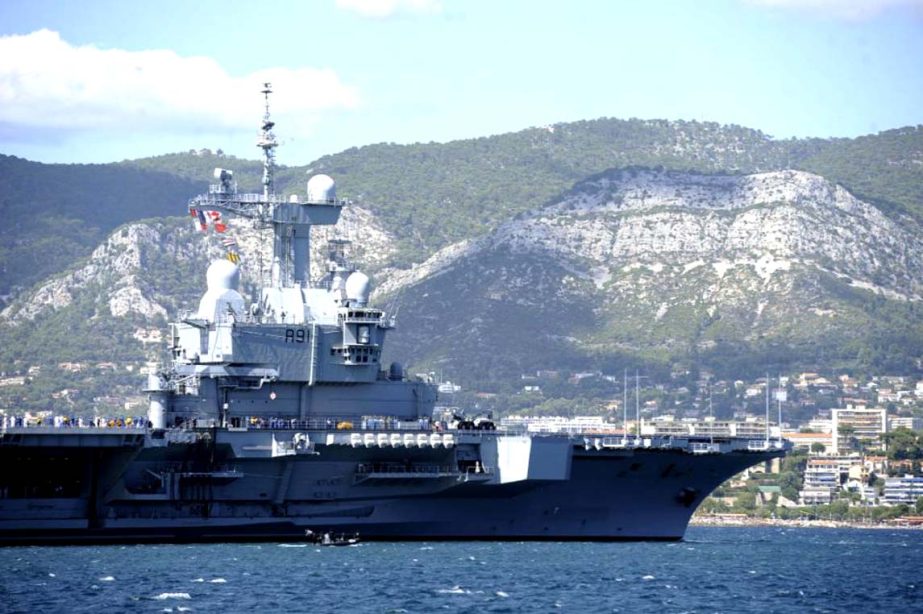 French aircraft carrier Charles de Gaulle pictured prior to a military parade in a bay near Toulon, southern France.