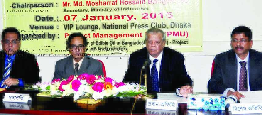 Industries Minister Amir Hossain Amu, among others, at a discussion on 'Vitamin A in edible oil' at the National Press Club on Wednesday.