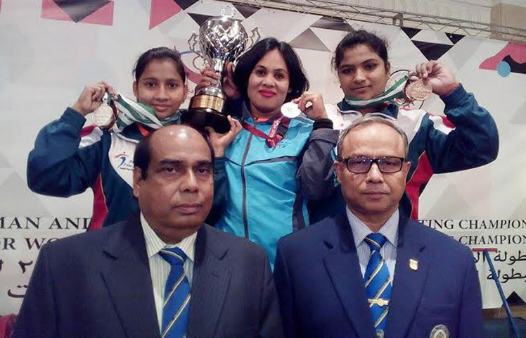 Members of Bangladesh Weightlifting team pose for a photo session at the Al Saad Sports Club in Doha, the capital city of Qatar recently.