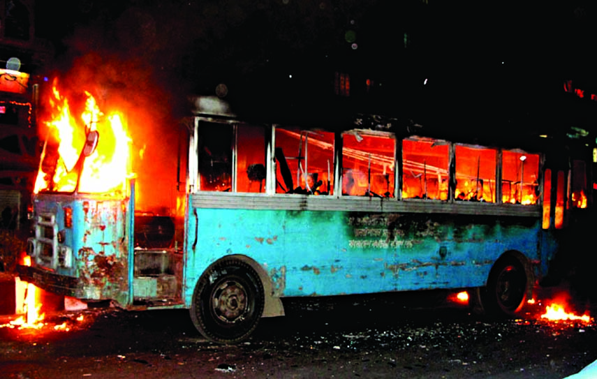 Unidentified miscreants set afire a govt staff bus near Baitul Mukarram Mosque on Wednesday-the 2nd day of blockade enforced by 20-party alliance.