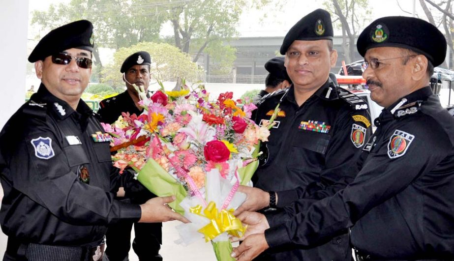 Newly appointed RAB Director General Benazir Ahmed greeted by the senior officials by presenting bouquet at RAB headquarters in the city on Wednesday.