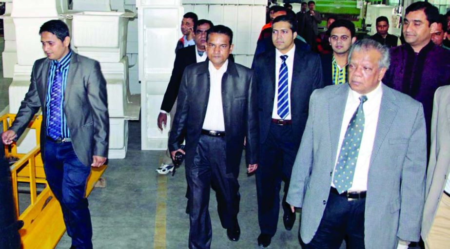 Industry Minister Amir Hossain Amu visiting Walton Factory at Chandra in Gazipur on Friday.