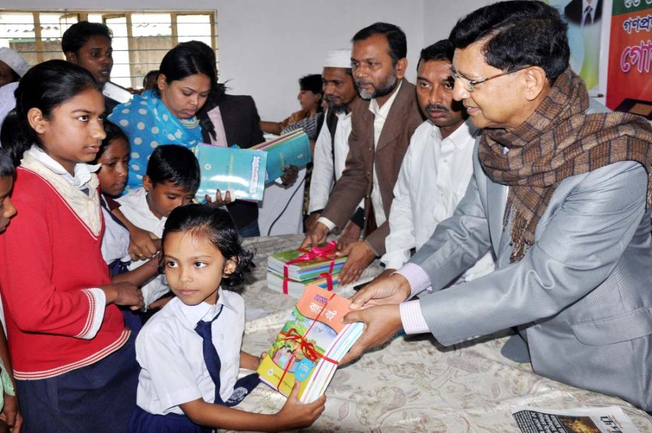 Students from different schools receiving textbooks from Golam Dastagir Gazi, Bir Protik, MP on the occasion of Textbook Festival at Chanpara Nobokisholaya High school in Rupganj, Narayanganj recently.