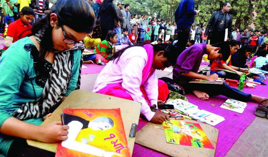 Children are engrossed in drawing at a painting competition organised on the occasion of Bangabandhu's Homecoming Day by Bangabandhu Jatiya Shishu Kishore Parishad at the Central Shaheed Minar premises in the city on Friday.