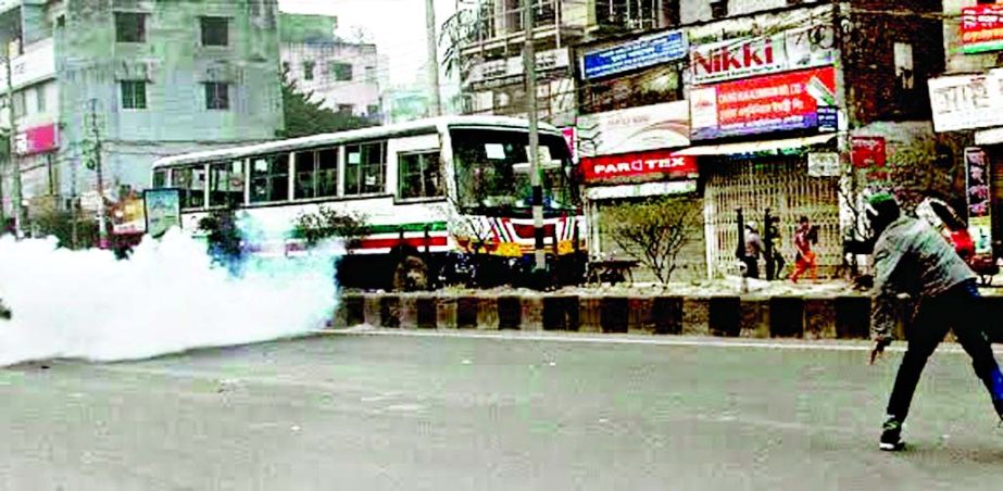Blockaders vandalizing passenger bus and blasts cocktails in city's Badda area on Friday.