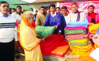 CHUNARUGHAT(Habiganj): AB Bank Ltd distributing blankets among tea garden workers on Sunday.