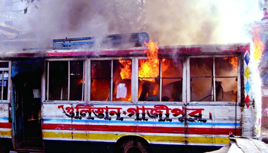 Miscreants set fire on a bus near Golapshah Mazar in city's Gulistan area on Monday.