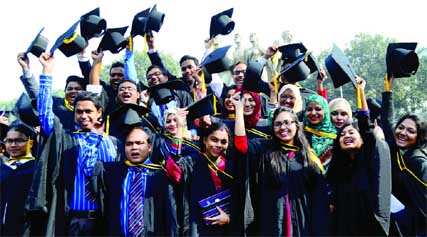 DU graduates who received gold medals and certificates at 49th convocation, raised their caps up in the air joyfully on Tuesday. Photo:Banglar Chokh