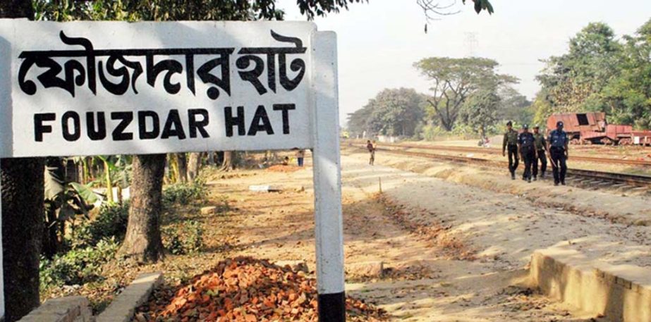Police and Ansar guarding rail line at Sitakundo in Chittagong to ensure security amid blockade programme yesterday.