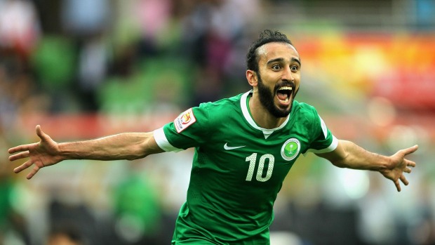 Mohammed Al Sahlawi of Saudi Arabia celebrates after scoring goal against North Korea on Tuesday.