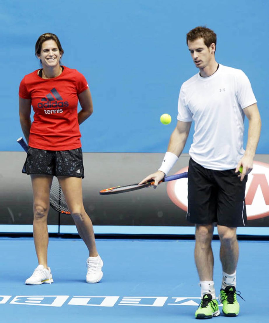 Britain's Andy Murray talks with his coach Amelie Mauresmo during a practice session at Melbourne Park ahead of the Australian Open tennis championship in Melbourne, Australia on Thursday.