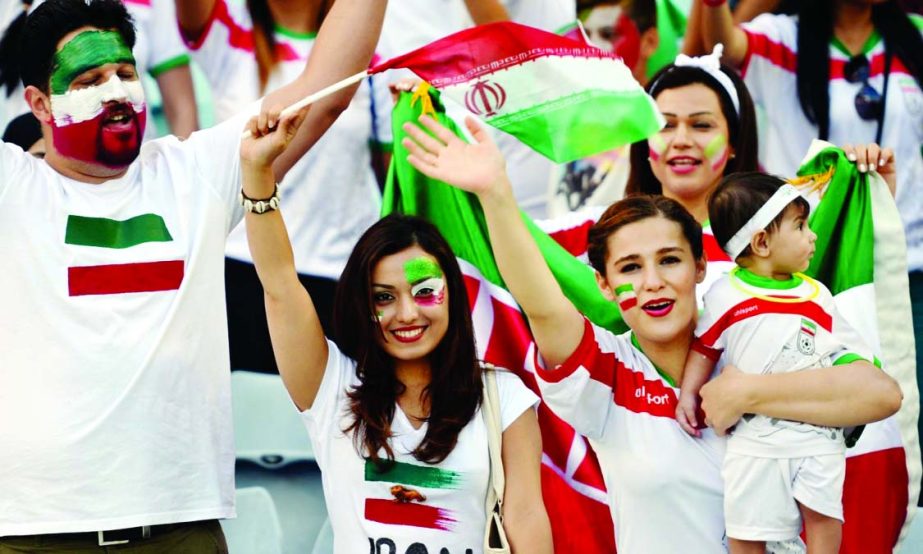 Iran fans cheer on their side en route to a win over Qatar in Sydney.