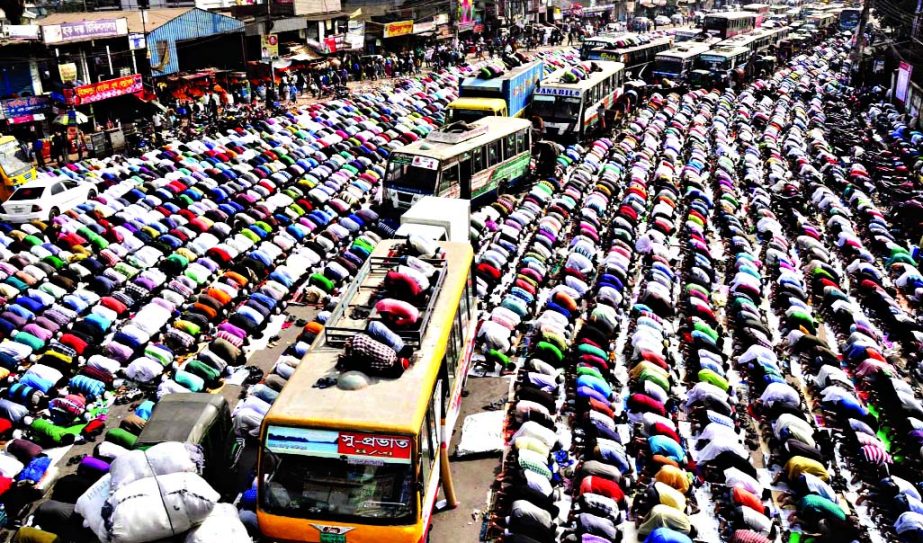 Thousands of devotees join the Jumma prayer on the first day of the 2nd phase of Bishwa Ijtema on Turag bank in Tongi.