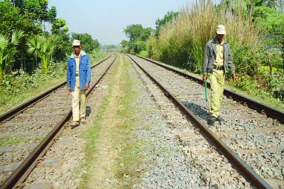 ISHWARDI(Pabna): Law enforcers guarding rail lines at Ishwardi Junction at Patibari area to avoid any kind of incidents by blockaders on Friday.