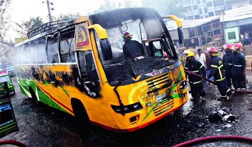 Pickets torched the passenger bus in city's Rayerbagh area on the 12th day of blockade on Dhaka-Chittagong Highway on Saturday.