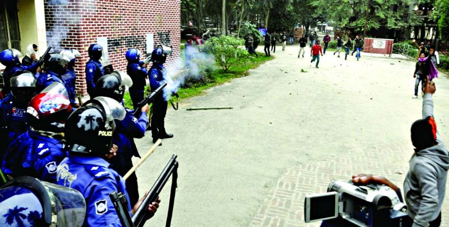 Police fire teargas shells to quell the violence as two groups of BCL students of Danesh Science and Technology University staged in clashes on Sunday.