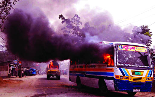 Pickets torched a bus and a truck at N'ganj area on Monday on the 13th day of blockade programme.