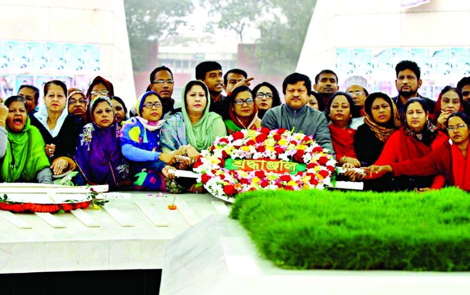 Marking the 79th birth anniversary of Shaheed President Ziaur Rahman, Jatiyatabadi Mohila Dal leaders placing wreaths at his mazar on Monday.