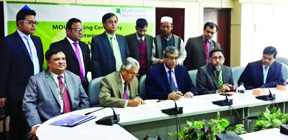Md Mizanur Rahman, Managing Director of Modhumoti Bank Limited and Engineer Taqsem A Khan, Managing Director of Dhaka WASA, sign an agreement in the city on Tuesday.