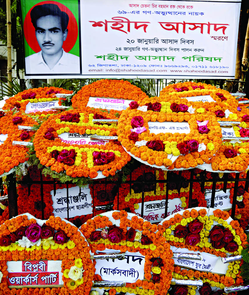 Different organisations including Asad family placed floral wreaths at the portrait of Shaheed Asad in front of Dhaka Medical College on Tuesday on the occasion of Shaheed Asad Day.