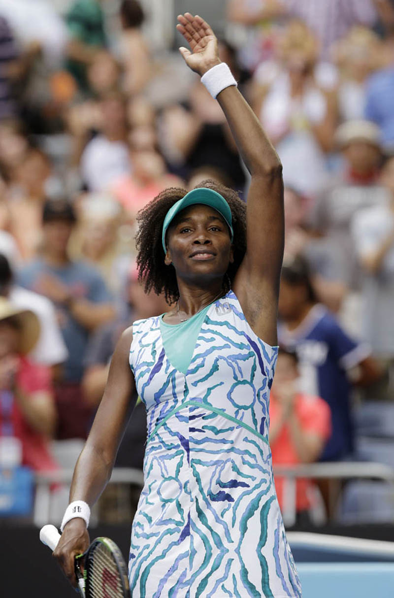 Venus Williams of the U.S. waves after defeating Maria-Teresa Torro-Flor of Spain during their first round match at the Australian Open tennis championship in Melbourne, Australia on Tuesday.