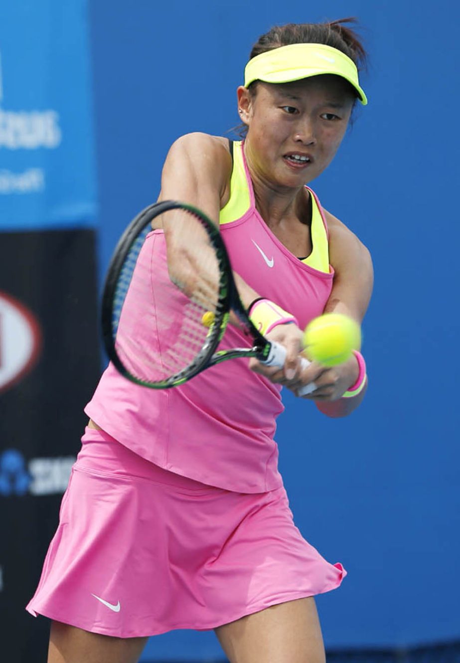 Taiwanâ€™s Chang Kai-Chen makes a backhand return to Chinaâ€™s Zheng Jie during their first round match at the Australian Open tennis championship in Melbourne, Australia on Tuesday.