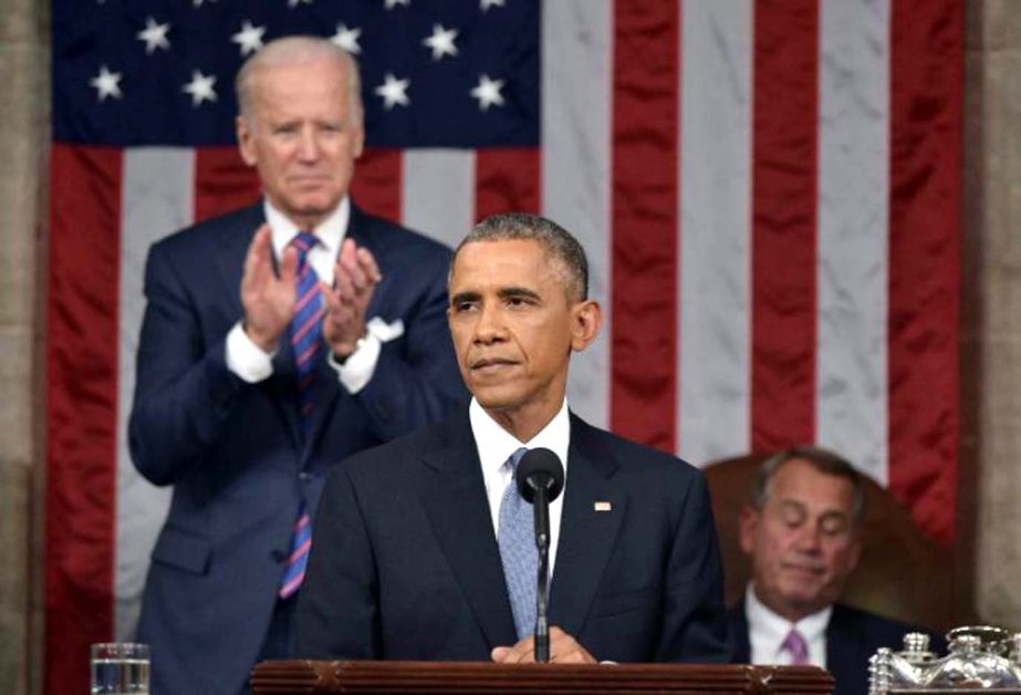 Vice President Joe Biden and House Speaker John Boehner of Ohio listens as President Barack Obama gives his State of the Union address on Capitol Hill in Washington on Tuesday.