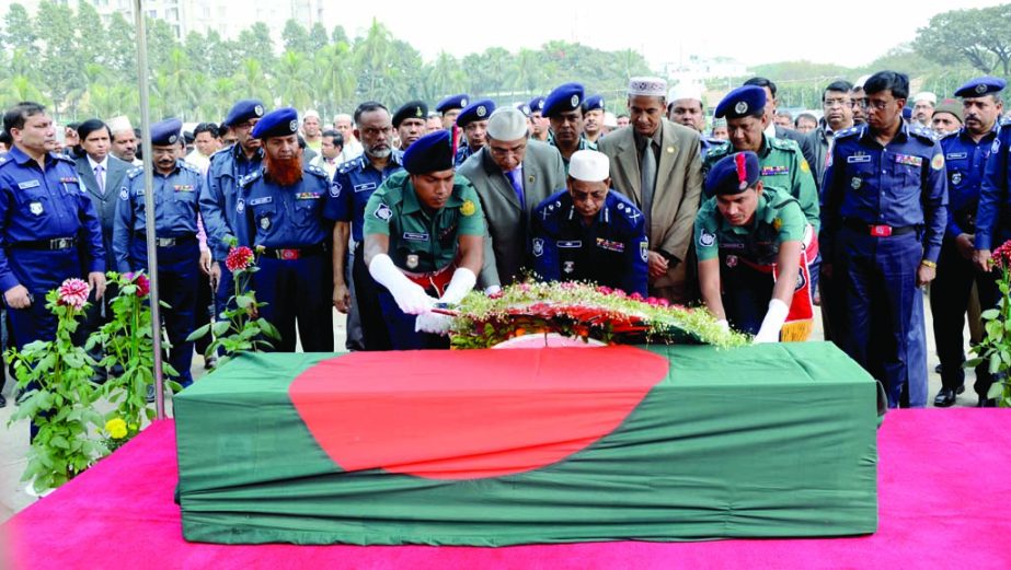 Inspector General of Police (IGP) AKM Shahidul Haq paying last respect to former Adviser to the Caretaker Government and ex-IGP Anwarul Iqbal by placing floral wreaths on his coffin at Rajarbagh Police Lines in the city on Thursday.