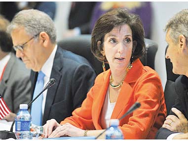 US Assistant Secretary of State for Western Hemisphere Affairs, Roberta S. Jacobson (centre), speaks to a member of her delegation during closed-door talks between Cuba and the United States on Thursday.